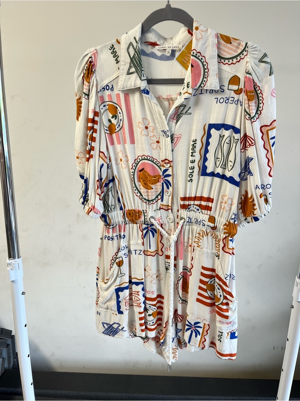 Graphic Print Button Romper in Cream with Multicolor Motifs